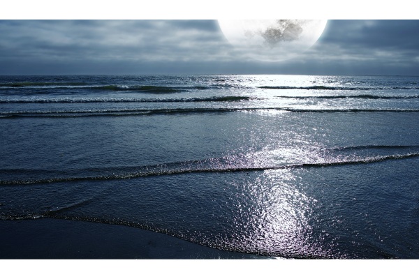 ocean tides and surfing - moon over the ocean